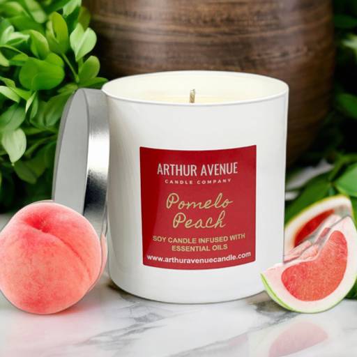 pomelo peach soy single wick candle. Free from synthetic additives, dyes, phthalates, and petroleum. Organic cotton wicks.